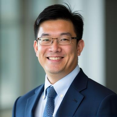Professional headshot of David Chen, a man in his late 30s with a friendly smile, Head of Wealth Management at Weave & Wealth.